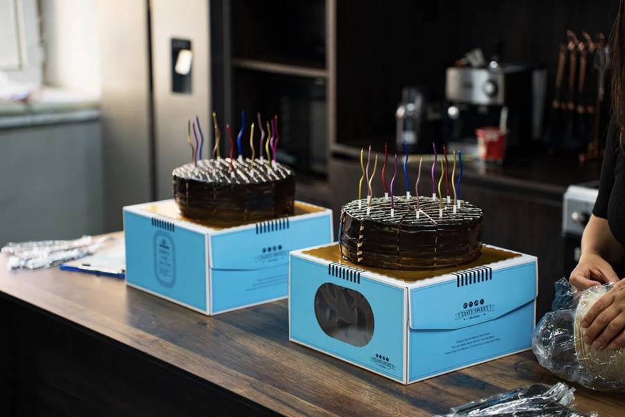 Two birthday cakes on a table