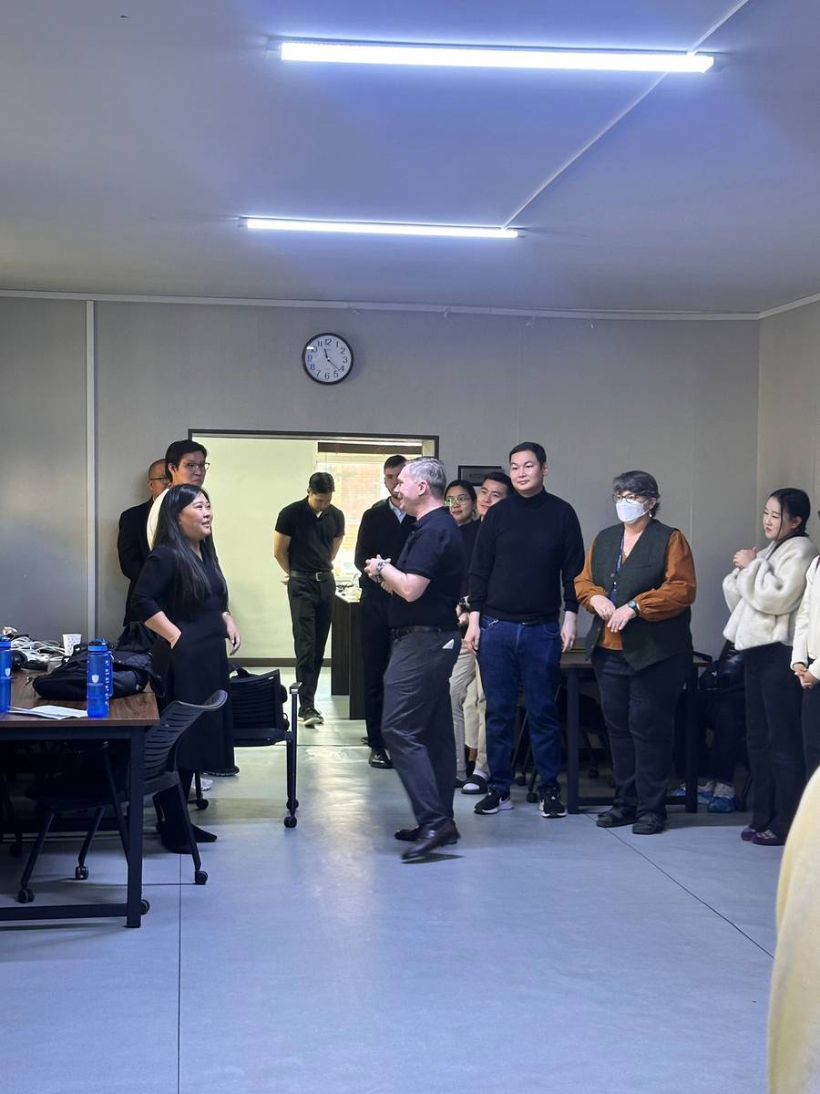 Faculty and students standing together during the celebration